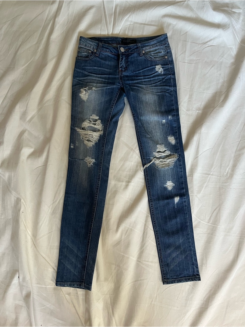 Costa Blanca Dark Blue Distressed Skinny Jeans. Size 27